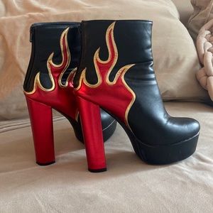 Punk black and red flame platform 6-7inch heels, size 9. Never worn.